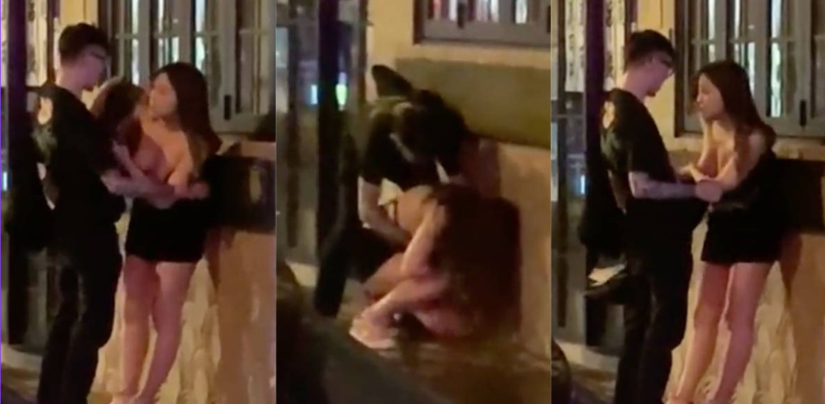 港女街头醉酒半裸上身露出双乳,男伴围衫使劲揩油!