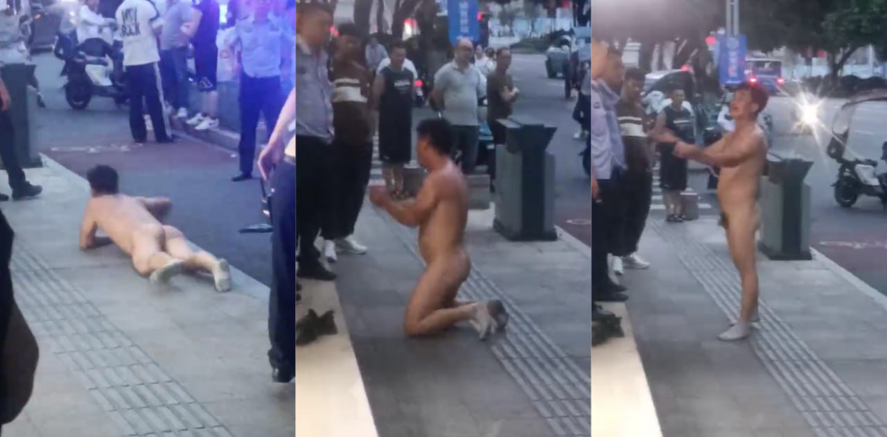 浙江瑞安某人流量很高的大街上惊现裸奔男,居然还一丝不挂的向警察下跪!