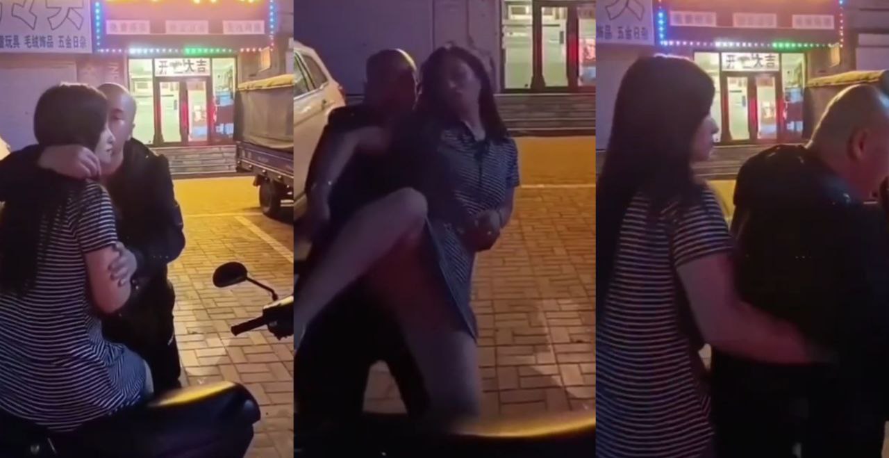 中国好男人的榜样!在宾馆门口接上了一天班的老婆 老婆的腿走路都难需要老公帮扶!