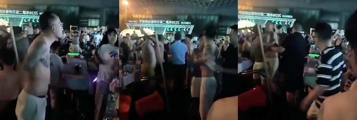 广西北海夜市街突发激烈冲突 多名纹身男子竟当着警察的面大打出手