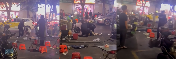 海口市区夜市突发持刀闹事事件 警察鸣枪警告后将男子当场控制